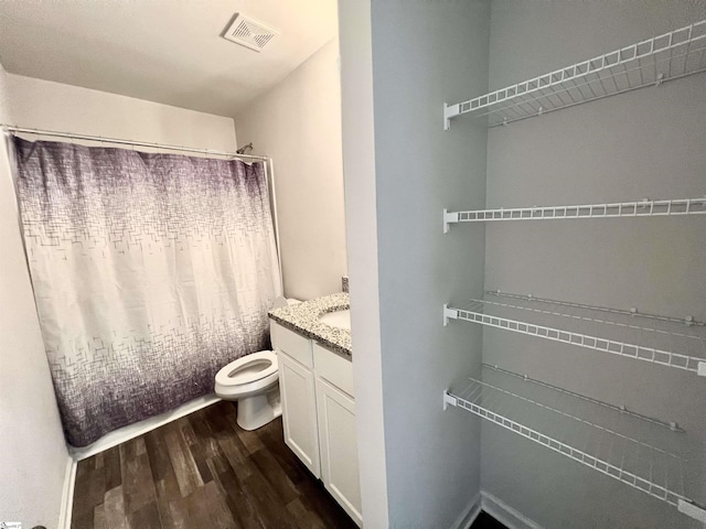 618 Farmstead Trl, Inman, SC 29349 - full bathroom with wood finished floors, toilet, and vanity