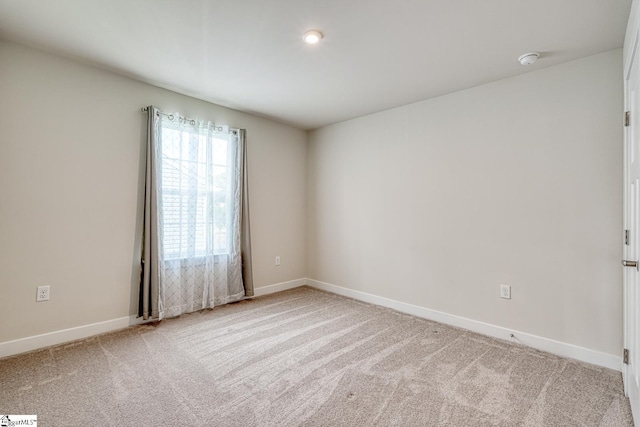 1128 Grovewood Ct, Moore, SC 29369 - carpeted empty room featuring baseboards and a smoke detector