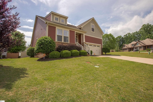 250 Chickadee Trl, Easley, SC 29642 - view of front of house with driveway, a front yard, an attached garage, and stone siding