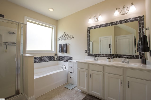 250 Chickadee Trl, Easley, SC 29642 - full bath featuring a stall shower, a bath, double vanity, and tile patterned flooring
