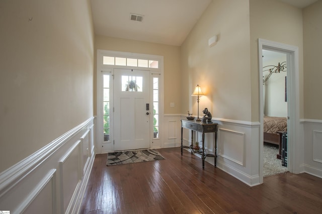 250 Chickadee Trl, Easley, SC 29642 - foyer entrance featuring a decorative wall, dark wood-style floors, and a wainscoted wall