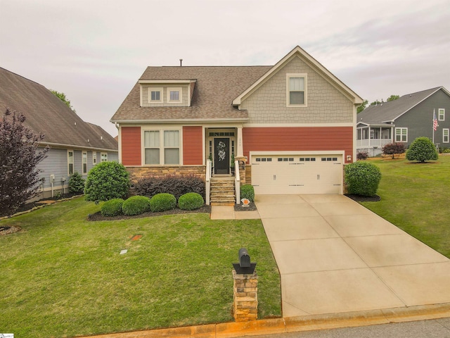 250 Chickadee Trl, Easley, SC 29642 - craftsman house featuring an attached garage, a front yard, concrete driveway, stone siding, and roof with shingles