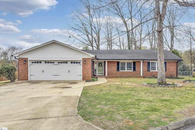 ranch-style house with a garage, driveway, brick siding, and a front yard