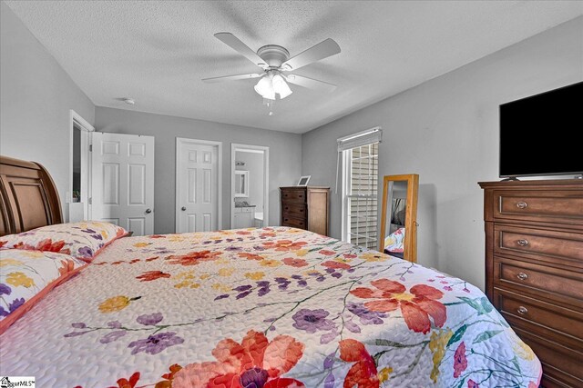 205 Willow Leaf Dr, Seneca, SC 29672 - bedroom featuring a textured ceiling, ensuite bath, and a ceiling fan