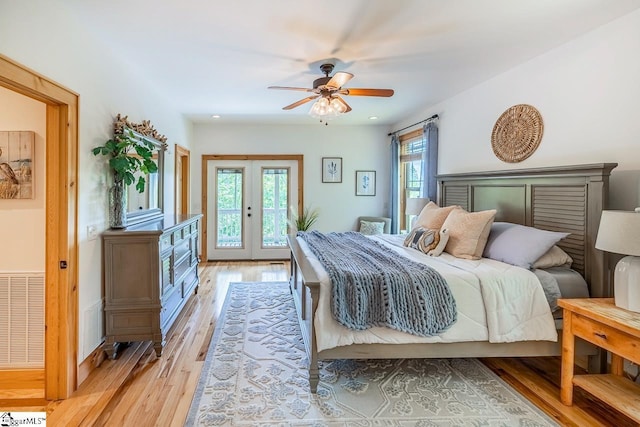 415 W V Thompson Rd, Rutherfordton, NC 28139 - bedroom featuring light wood-type flooring, access to outside, a ceiling fan, and french doors