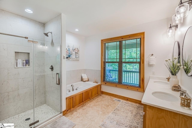 415 W V Thompson Rd, Rutherfordton, NC 28139 - bathroom featuring tile patterned floors, a stall shower, a garden tub, double vanity, and recessed lighting