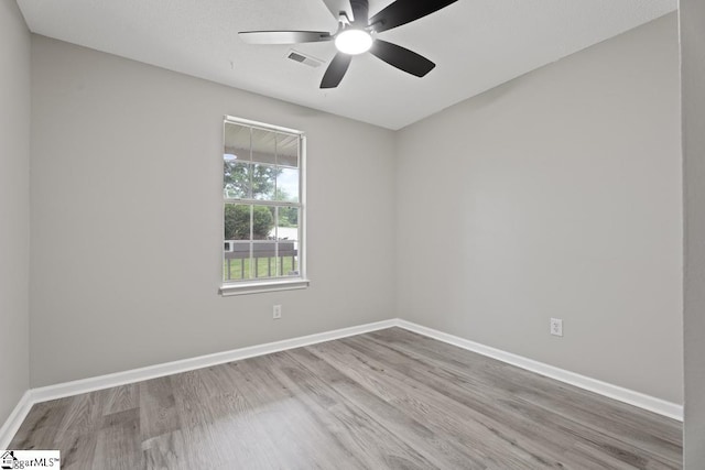 338 E Celestial Dr, Greer, SC 29651 - spare room with wood finished floors, baseboards, and a ceiling fan