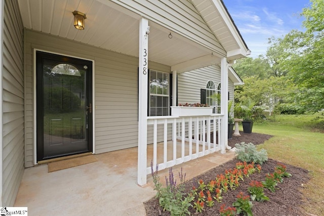 338 E Celestial Dr, Greer, SC 29651 - view of exterior entry featuring covered porch and a lawn