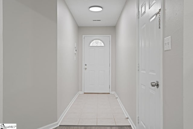 338 E Celestial Dr, Greer, SC 29651 - doorway with light tile patterned flooring and baseboards