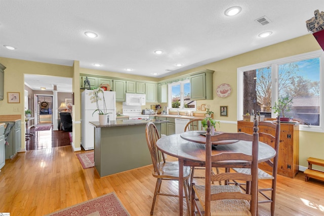 122 Tanager Cir, Greer, SC 29650 - dining area with light wood-style floors and recessed lighting