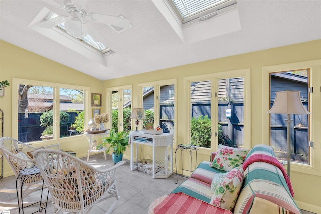 122 Tanager Cir, Greer, SC 29650 - sunroom featuring a skylight, tile patterned flooring, lofted ceiling, and baseboards