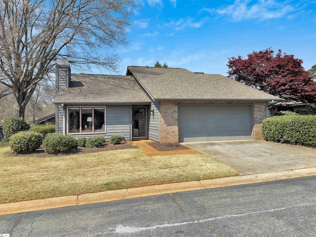 122 Tanager Cir, Greer, SC 29650 - view of front of property with a garage, brick siding, driveway, and a chimney