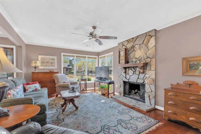 122 Tanager Cir, Greer, SC 29650 - living room with ornamental molding, ceiling fan, wood finished floors, a fireplace, and baseboards