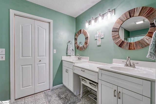 103 Cheyenne Ridge Rd, Campobello, SC 29322 - full bath with double vanity, tile patterned floors, a textured ceiling, and baseboards