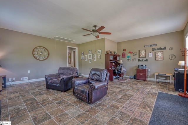 103 Cheyenne Ridge Rd, Campobello, SC 29322 - living room with attic access, a ceiling fan, baseboards, and stone finish floors