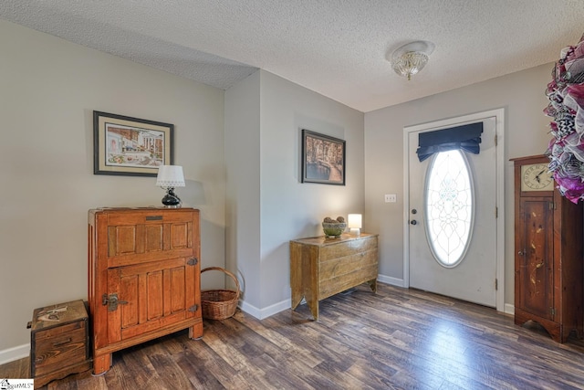103 Cheyenne Ridge Rd, Campobello, SC 29322 - foyer with dark wood-style floors, a textured ceiling, and baseboards