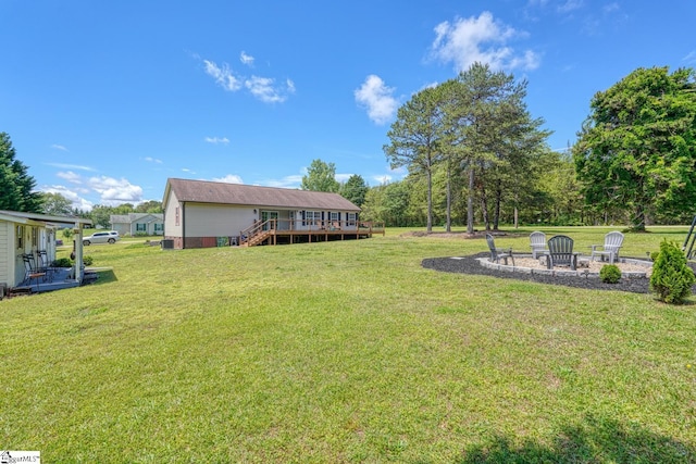 103 Cheyenne Ridge Rd, Campobello, SC 29322 - view of grassy yard with a deck, an outdoor fire pit, and stairs