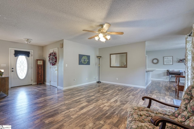 103 Cheyenne Ridge Rd, Campobello, SC 29322 - foyer entrance with ceiling fan, a textured ceiling, wood finished floors, and baseboards