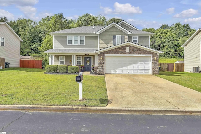 157 Stonewood Crossing Dr, Boiling Springs, SC 29316 - view of front of home with driveway, stone siding, central AC, and a porch