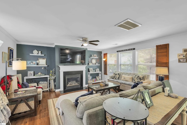 157 Stonewood Crossing Dr, Boiling Springs, SC 29316 - living room with ornamental molding, ceiling fan, a fireplace with flush hearth, and wood finished floors