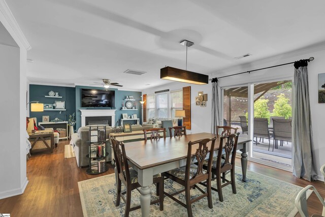 157 Stonewood Crossing Dr, Boiling Springs, SC 29316 - dining room with ornamental molding, wood finished floors, ceiling fan, a fireplace, and baseboards