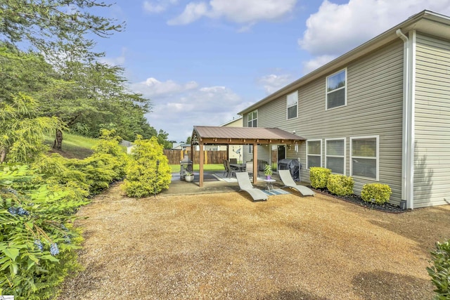 157 Stonewood Crossing Dr, Boiling Springs, SC 29316 - rear view of property with a patio and fence
