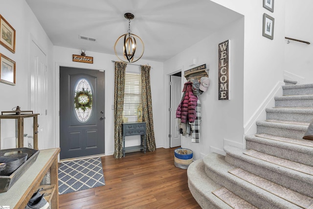 157 Stonewood Crossing Dr, Boiling Springs, SC 29316 - entrance foyer with stairway, dark wood-type flooring, a chandelier, and baseboards