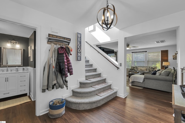157 Stonewood Crossing Dr, Boiling Springs, SC 29316 - stairs featuring a chandelier, wood finished floors, ceiling fan, and baseboards