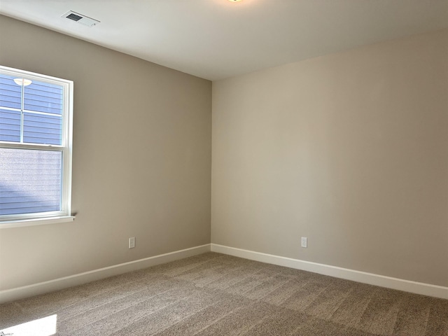 207 Fenner Pl, Greenville, SC 29607 - carpeted empty room with baseboards and plenty of natural light