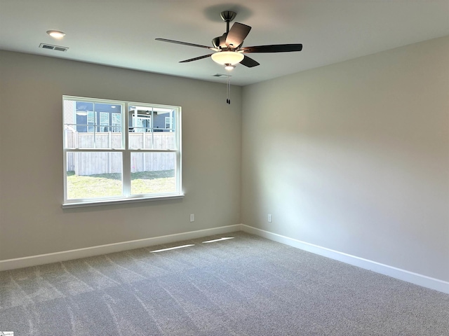 207 Fenner Pl, Greenville, SC 29607 - spare room featuring carpet flooring, baseboards, and a ceiling fan