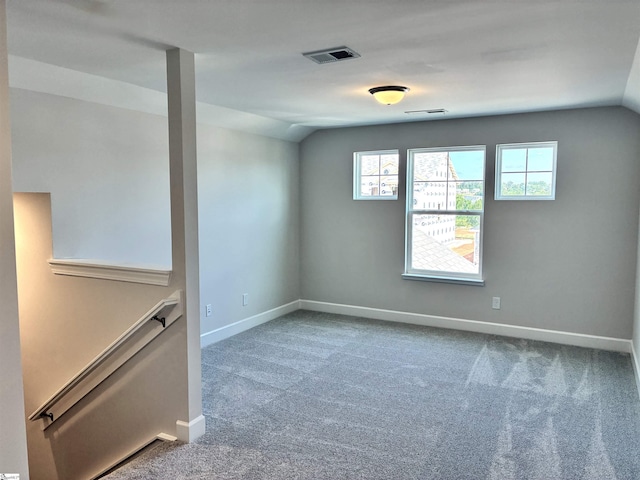 207 Fenner Pl, Greenville, SC 29607 - carpeted spare room with baseboards and lofted ceiling