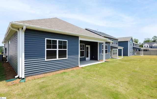 207 Fenner Pl, Greenville, SC 29607 - rear view of house featuring a yard and a patio