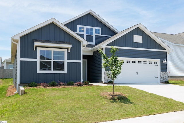 207 Fenner Pl, Greenville, SC 29607 - view of front of home featuring a garage, a front yard, and concrete driveway