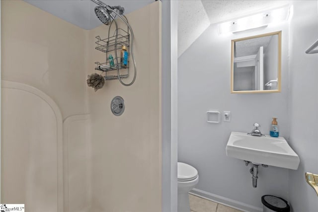 150 Orchard Dr, Inman, SC 29349 - full bath with a shower, tile patterned floors, toilet, a sink, and a textured ceiling