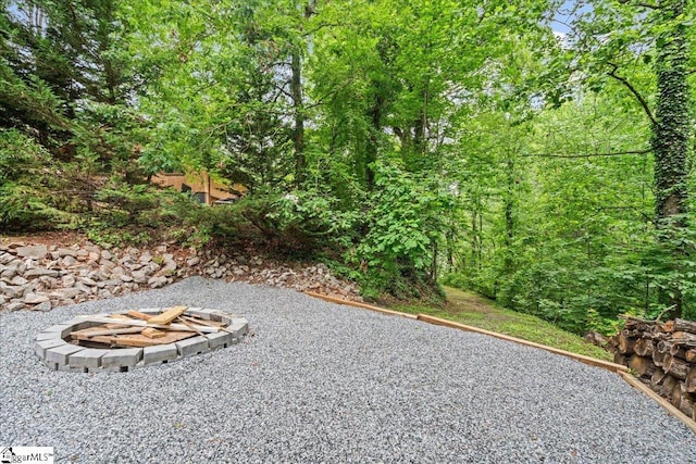 150 Orchard Dr, Inman, SC 29349 - view of yard featuring an outdoor fire pit