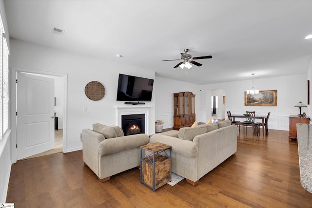 205 Hartwood Lake Ln, Greer, SC 29650 - living room with dark wood-type flooring, a glass covered fireplace, and ceiling fan