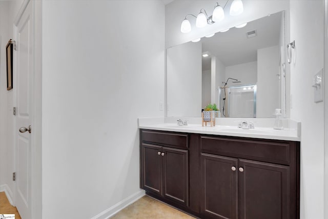 205 Hartwood Lake Ln, Greer, SC 29650 - bathroom with a stall shower, baseboards, and double vanity
