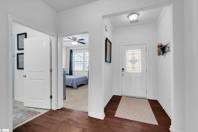 205 Hartwood Lake Ln, Greer, SC 29650 - entrance foyer with dark wood-style flooring, a ceiling fan, baseboards, and crown molding