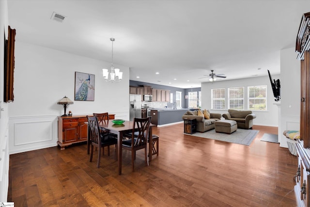 205 Hartwood Lake Ln, Greer, SC 29650 - dining space featuring a ceiling fan, a chandelier, dark wood finished floors, and recessed lighting
