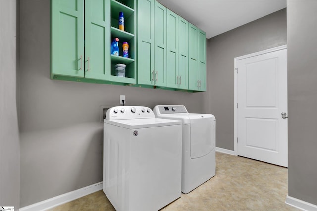 205 Hartwood Lake Ln, Greer, SC 29650 - laundry room with washing machine and clothes dryer, cabinet space, baseboards, and light flooring