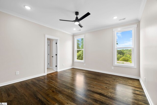 1047 Ansel School Rd, Greer, SC 29651 - spare room featuring crown molding, baseboards, ceiling fan, dark wood-type flooring, and recessed lighting