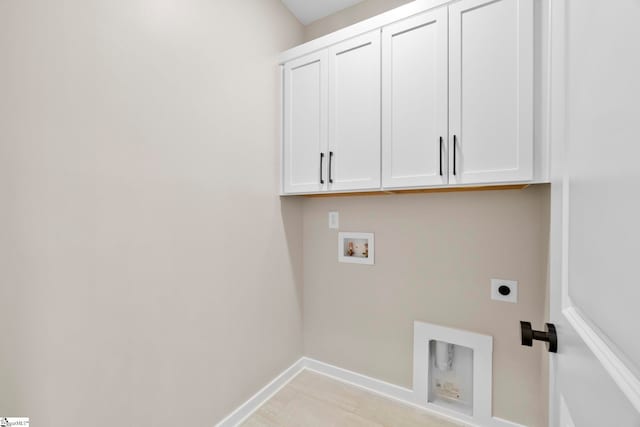 1047 Ansel School Rd, Greer, SC 29651 - clothes washing area featuring hookup for an electric dryer, cabinet space, hookup for a washing machine, baseboards, and light tile patterned floors