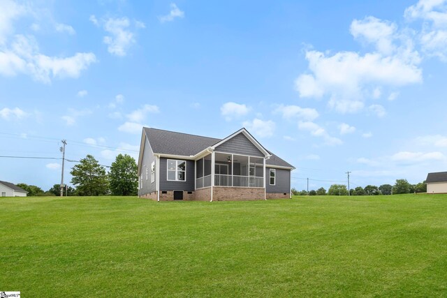 1047 Ansel School Rd, Greer, SC 29651 - rear view of house with crawl space, a sunroom, and a lawn