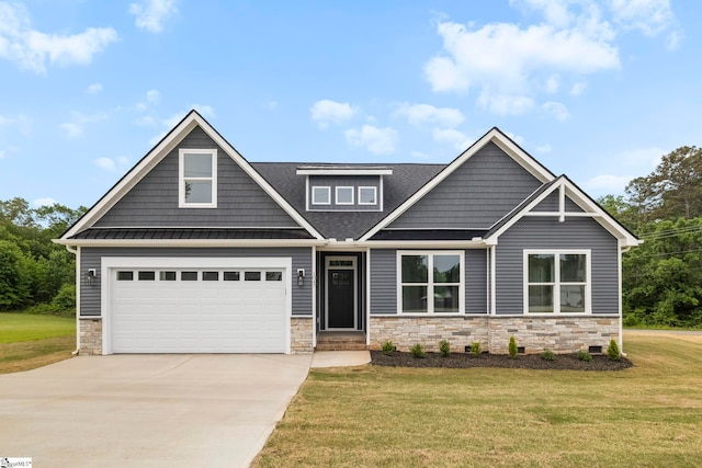 1047 Ansel School Rd, Greer, SC 29651 - craftsman-style house featuring stone siding, driveway, a front lawn, and a standing seam roof