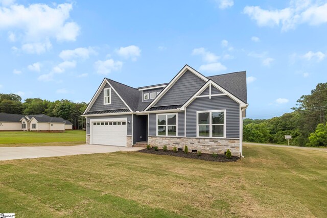1047 Ansel School Rd, Greer, SC 29651 - craftsman-style house featuring concrete driveway, stone siding, a front yard, and an attached garage