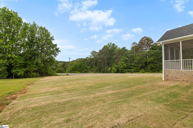 1047 Ansel School Rd, Greer, SC 29651 - view of grassy yard featuring a sunroom