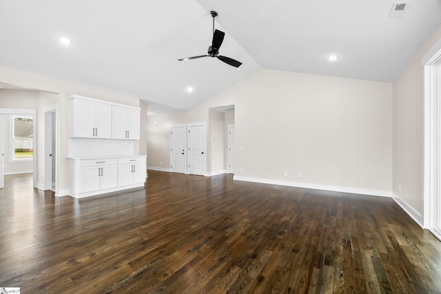 1047 Ansel School Rd, Greer, SC 29651 - unfurnished living room featuring ceiling fan, dark wood finished floors, lofted ceiling, baseboards, and recessed lighting