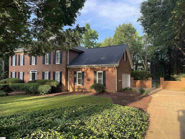 102 Quail Creek Ln, Greenville, SC 29615 - view of front of property with brick siding, a garage, and roof with shingles