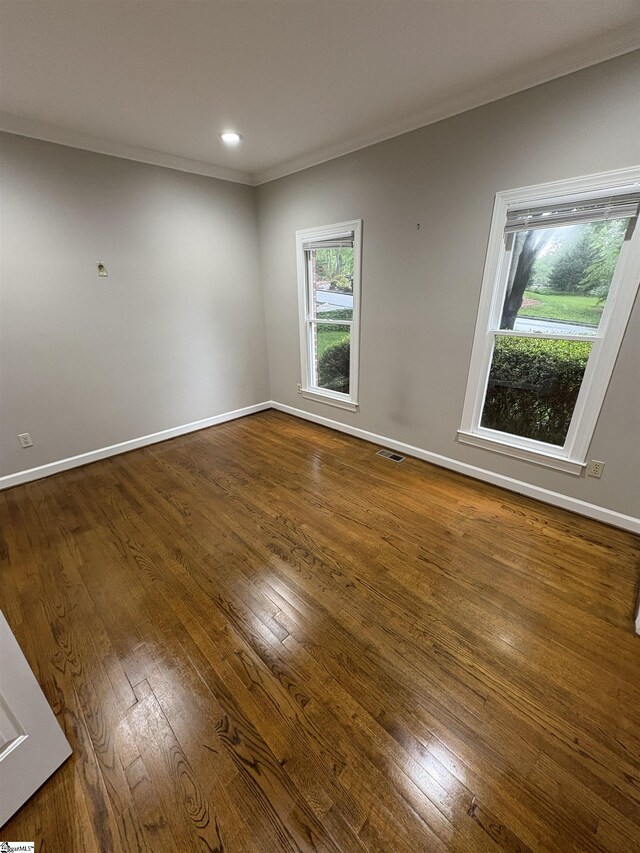 102 Quail Creek Ln, Greenville, SC 29615 - spare room with crown molding, dark wood-type flooring, baseboards, and recessed lighting