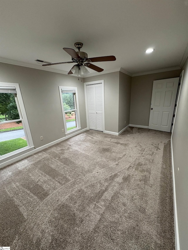 102 Quail Creek Ln, Greenville, SC 29615 - unfurnished bedroom featuring ornamental molding, baseboards, carpet, a closet, and a ceiling fan